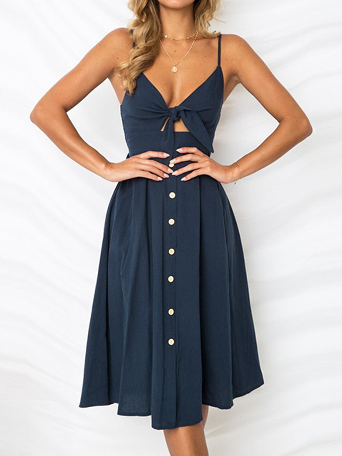 Cutout Smocked Sweetheart Neck Cami Dress with Tied and Decorative Button Details.
