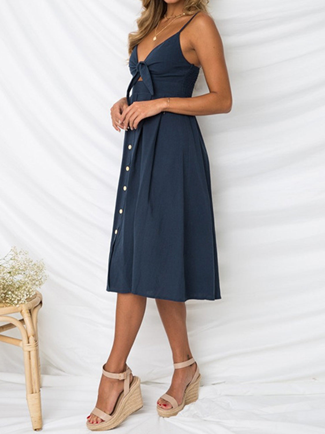 Cutout Smocked Sweetheart Neck Cami Dress with Tied and Decorative Button Details.