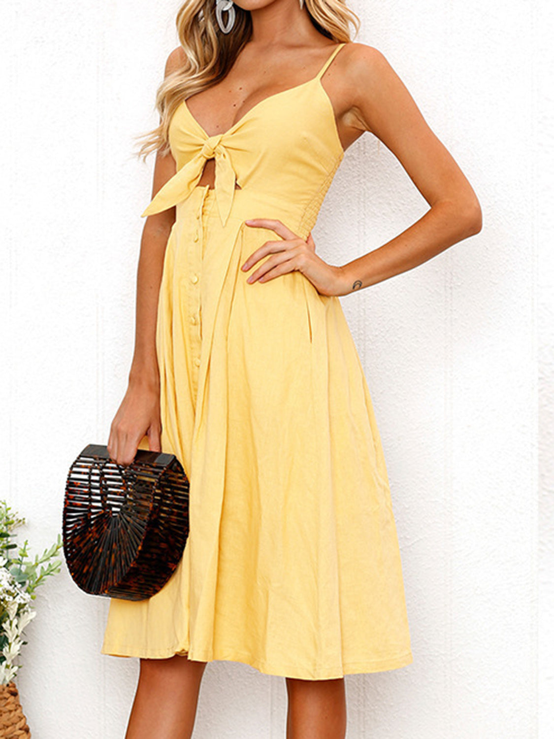 Cutout Smocked Sweetheart Neck Cami Dress with Tied and Decorative Button Details.