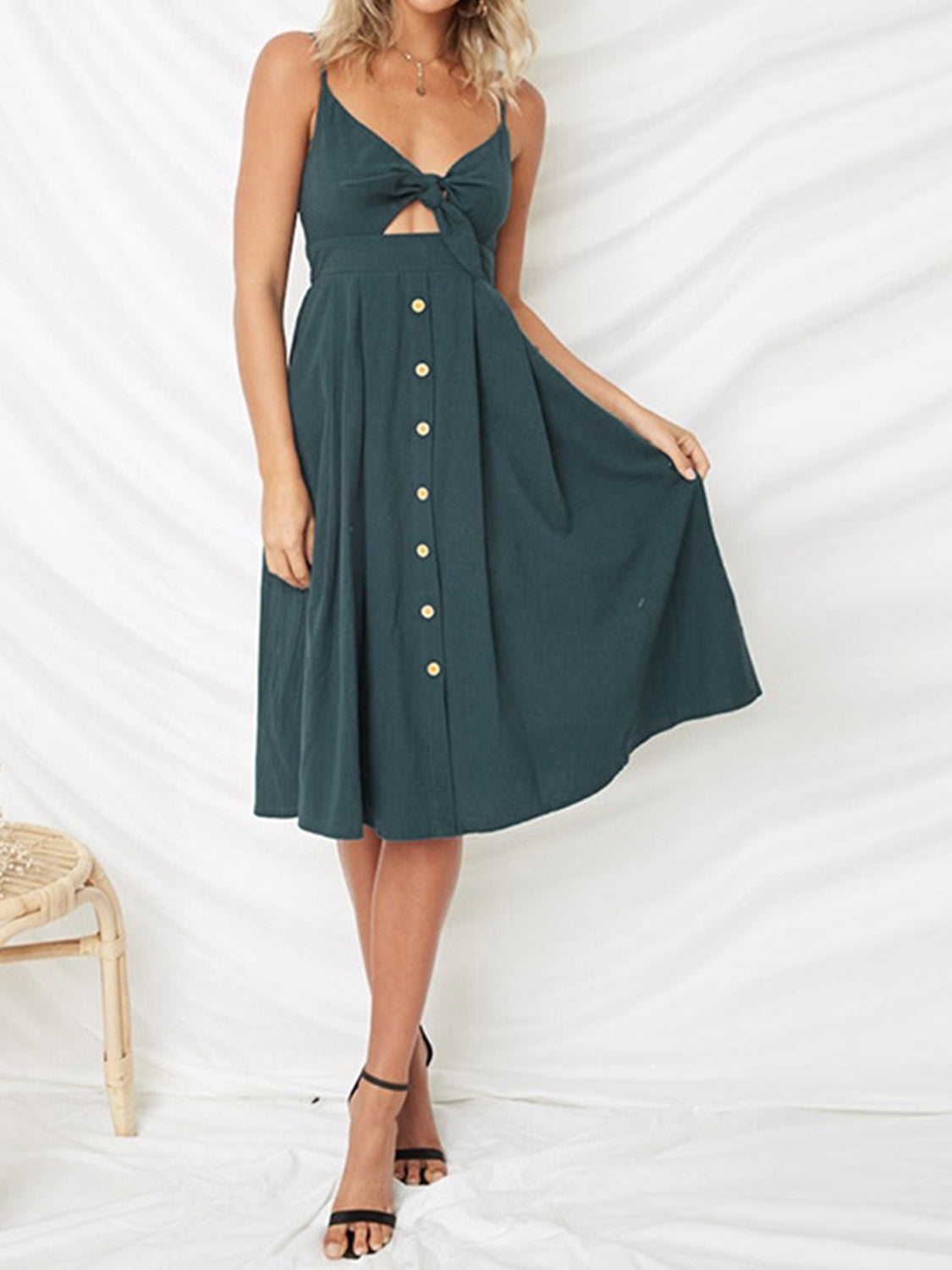Cutout Smocked Sweetheart Neck Cami Dress with Tied and Decorative Button Details.