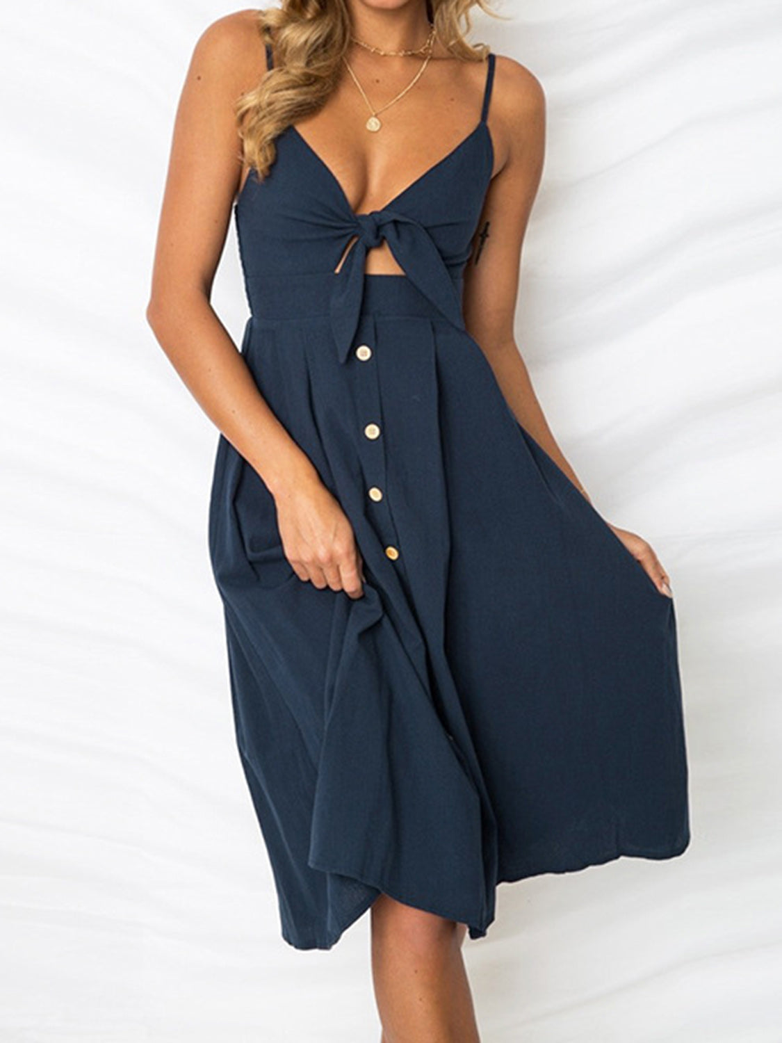 Cutout Smocked Sweetheart Neck Cami Dress with Tied and Decorative Button Details.