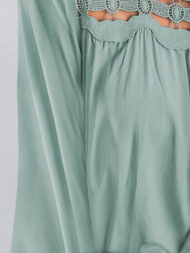 Cutout square neck long sleeve blouse with lace detail.