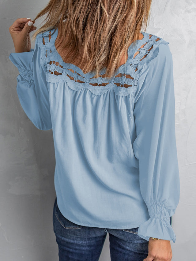 Cutout square neck long sleeve blouse with lace detail.