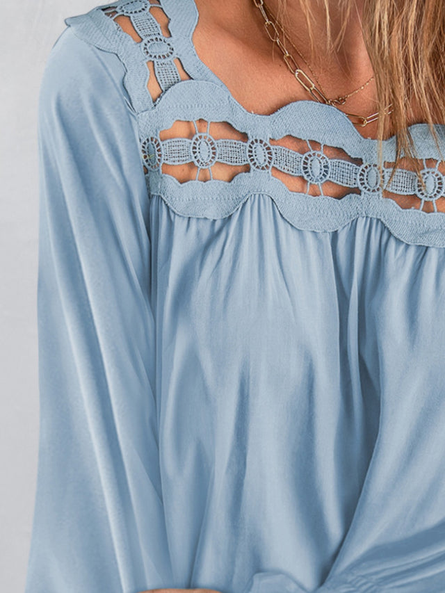 Cutout square neck long sleeve blouse with lace detail.