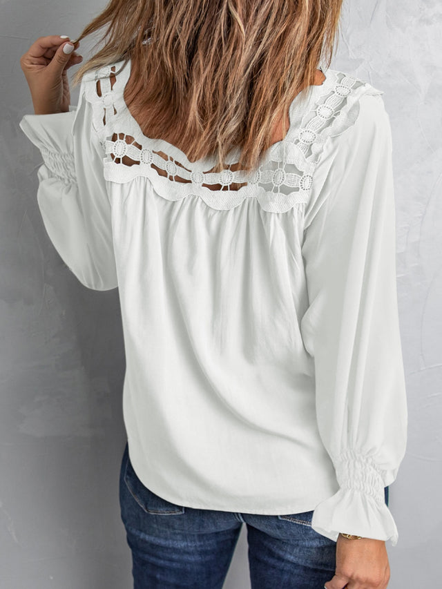 Cutout square neck long sleeve blouse with lace detail.