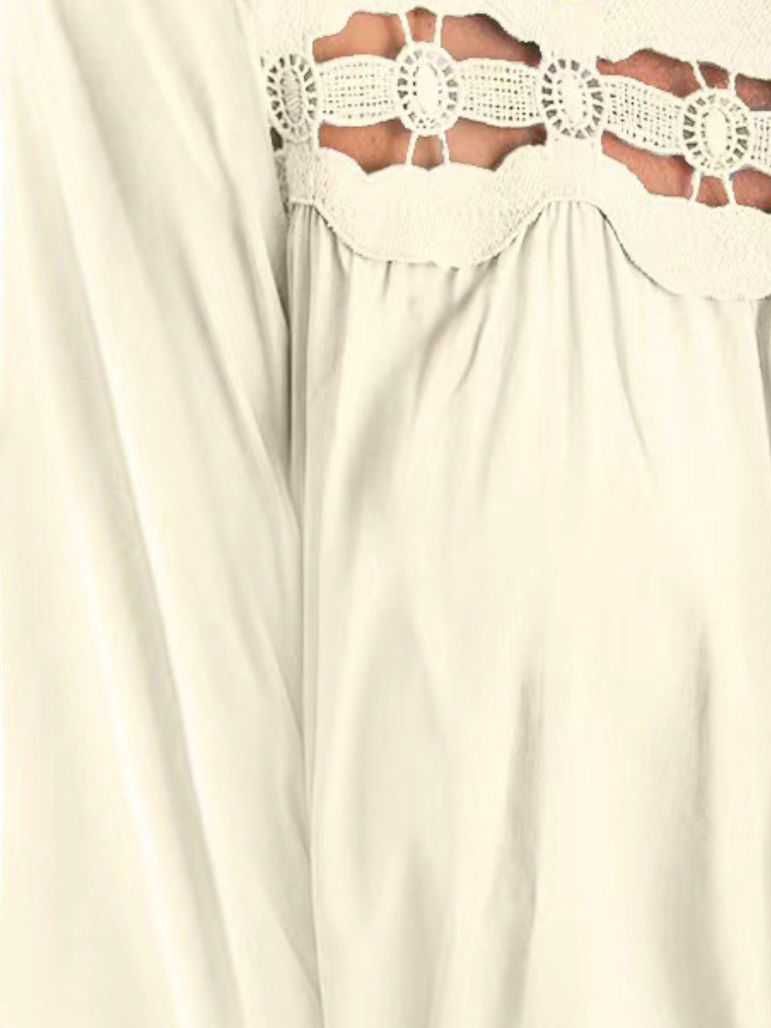 Cutout square neck long sleeve blouse with lace detail.