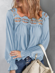 Cutout square neck long sleeve blouse with lace detail.