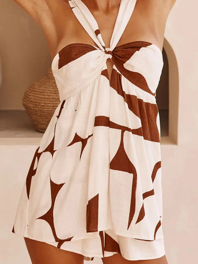 Cutout sweetheart neck cami with twisted and ruched details.