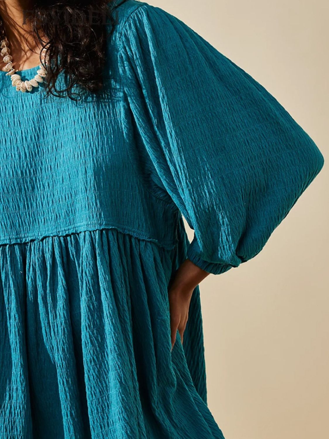 Cutout Textured Long Sleeve Mini Dress.