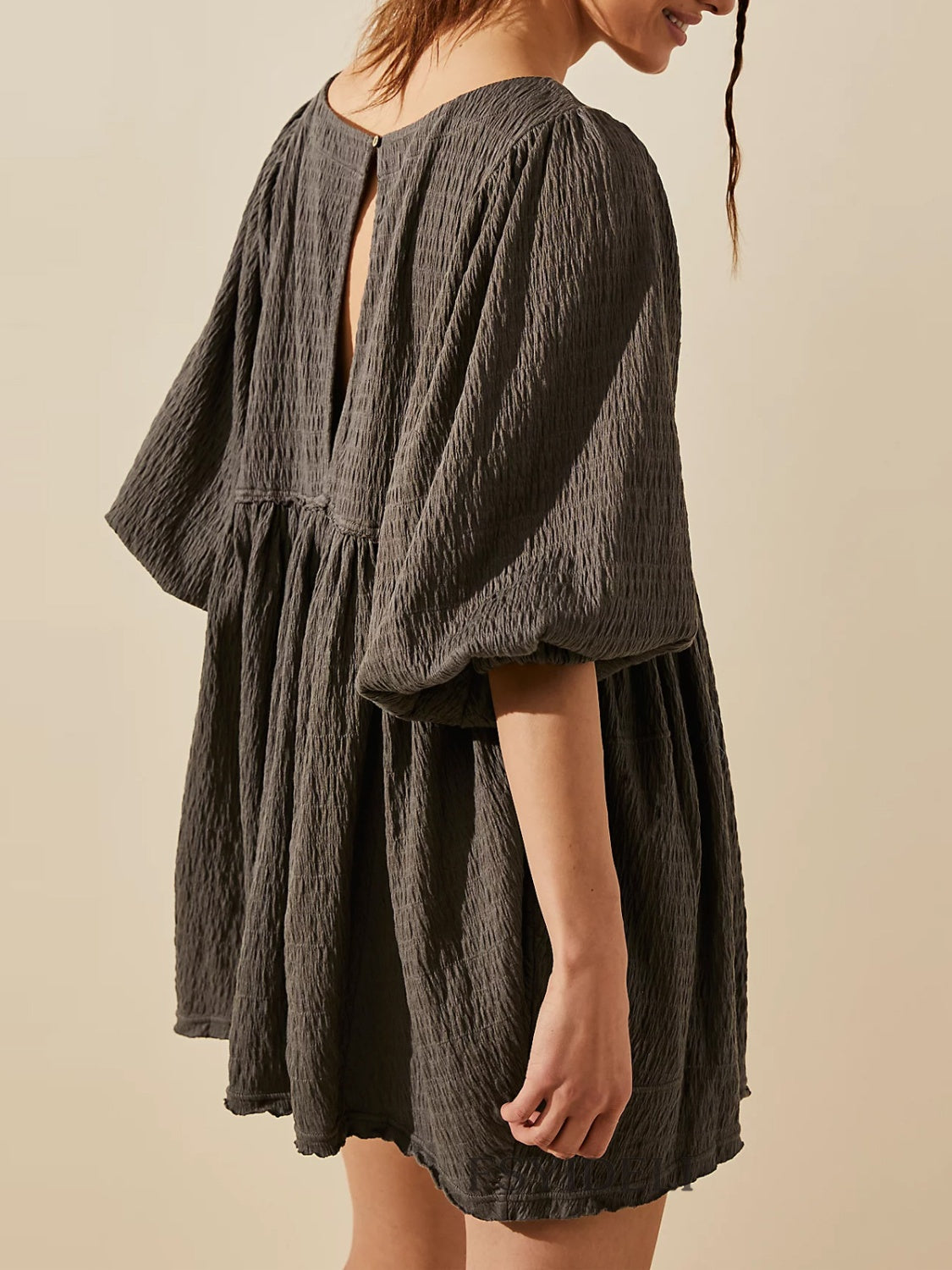 Cutout Textured Long Sleeve Mini Dress.