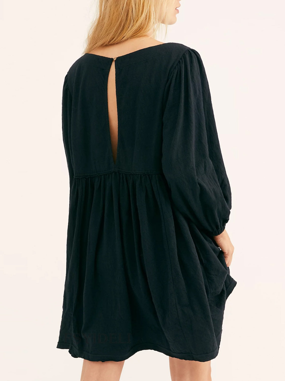 Cutout Textured Long Sleeve Mini Dress.