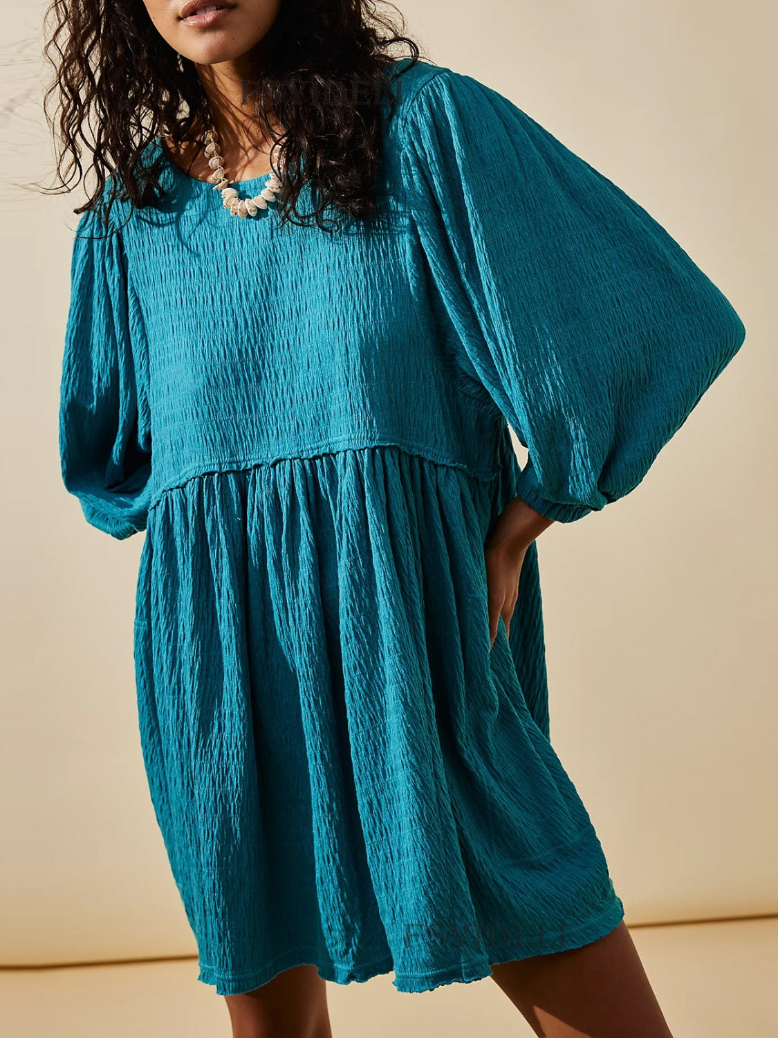 Cutout Textured Long Sleeve Mini Dress.