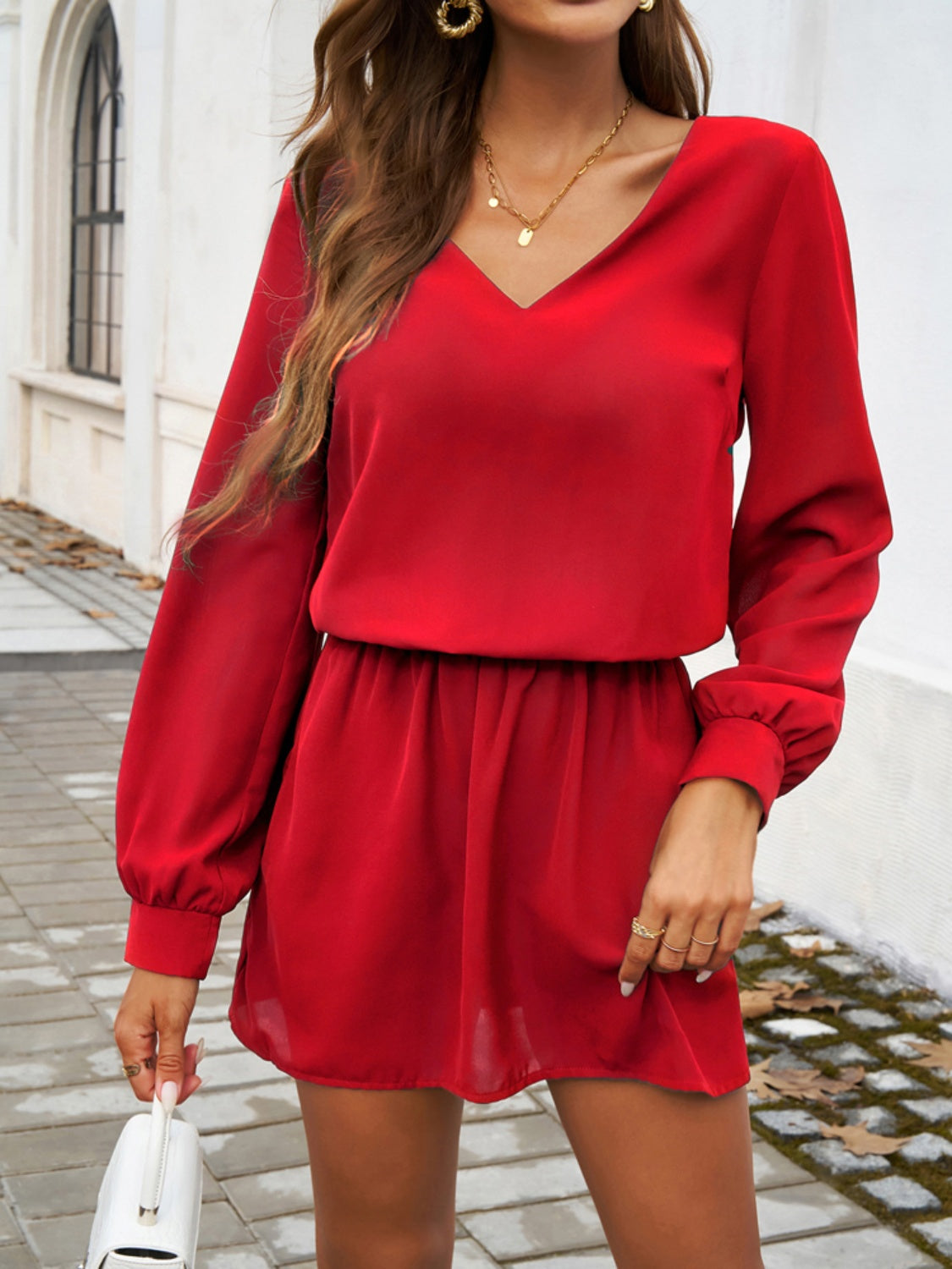 Devine Cutout V-Neck Long Sleeve Mini Dress.