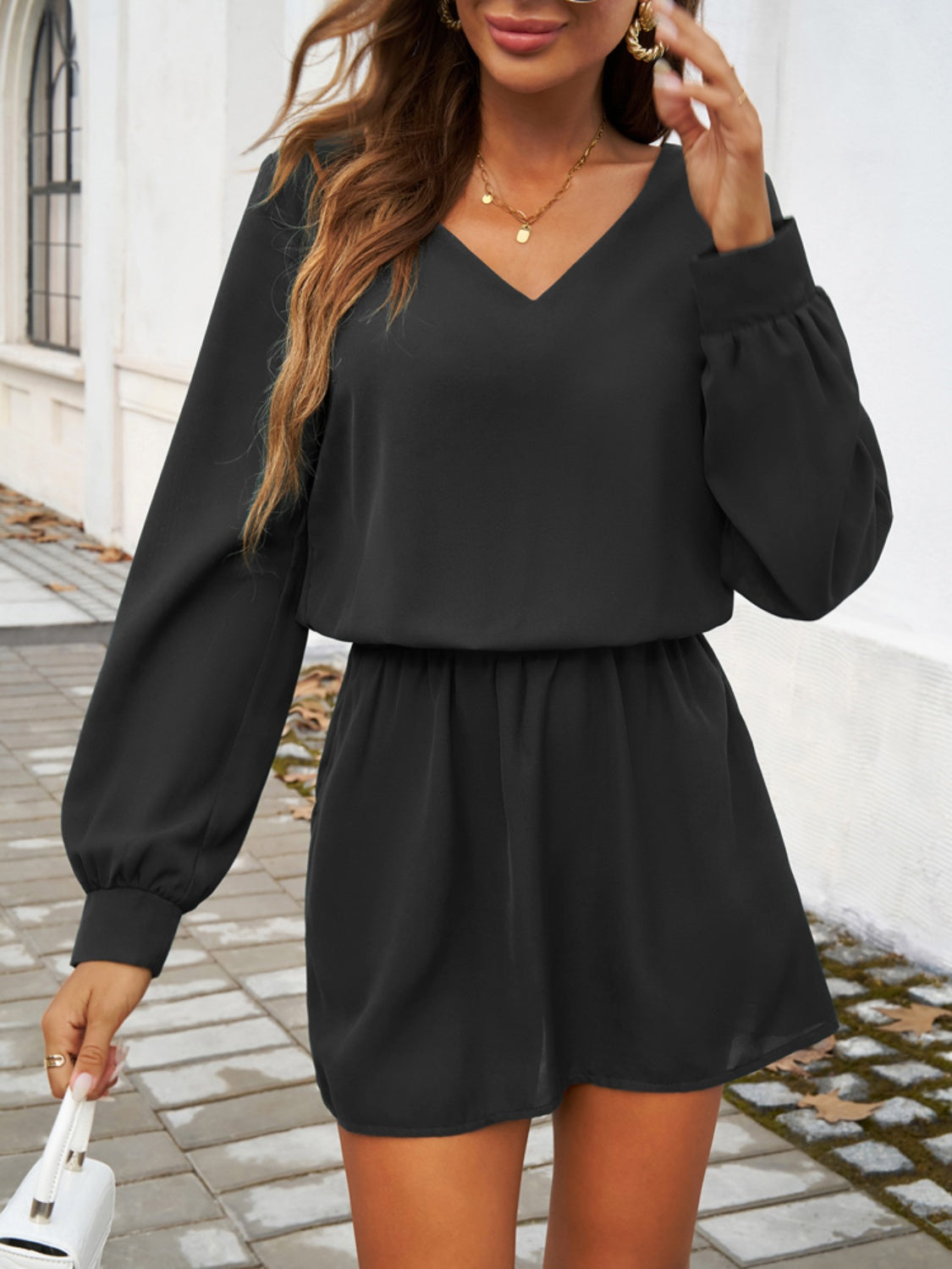 Devine Cutout V-Neck Long Sleeve Mini Dress.