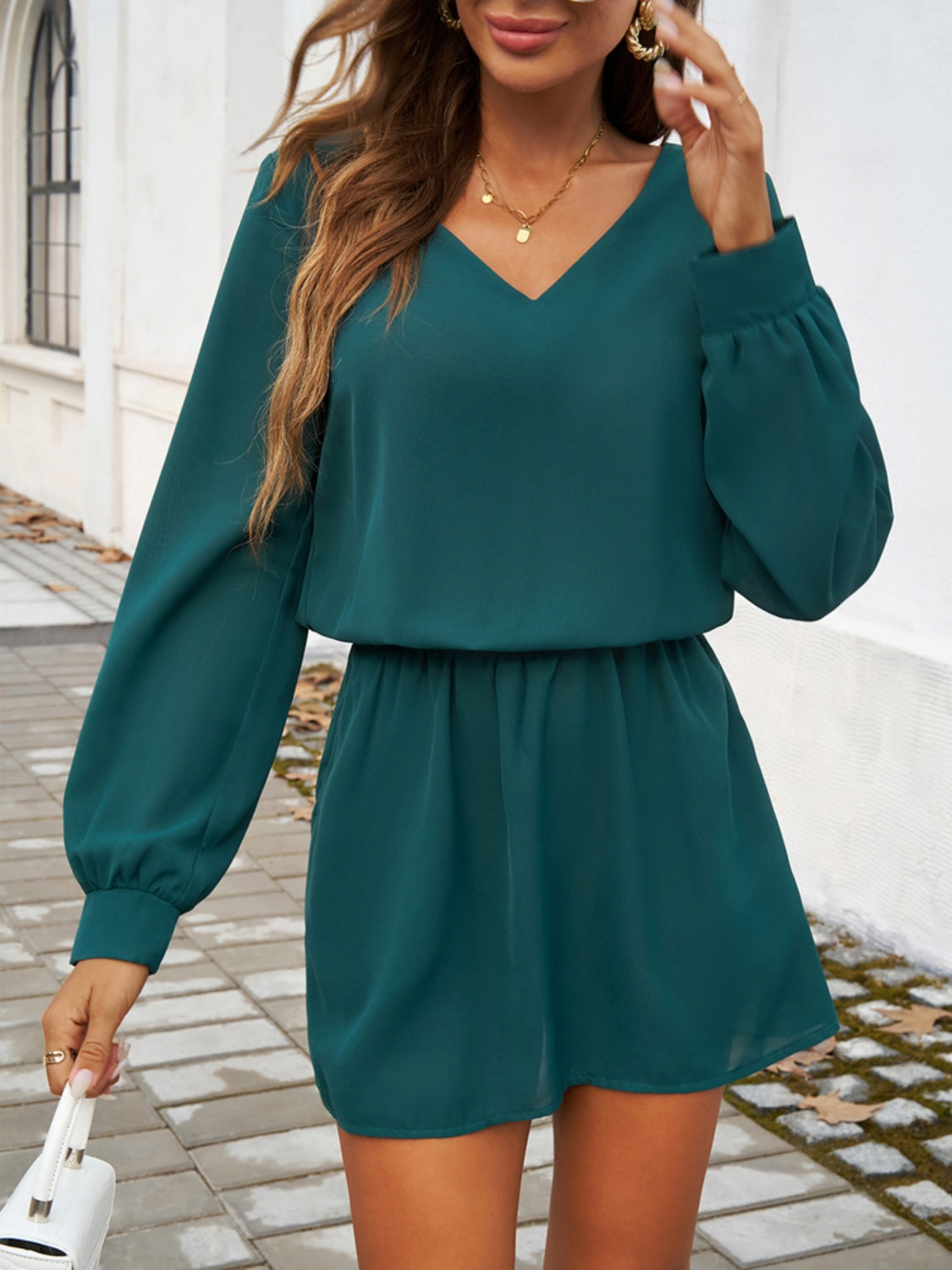 Devine Cutout V-Neck Long Sleeve Mini Dress.