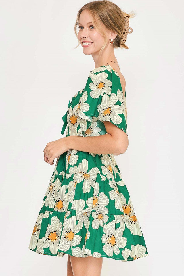 Umgee Plus Size Daisy Print Mini Dress with Ribbon Details.
