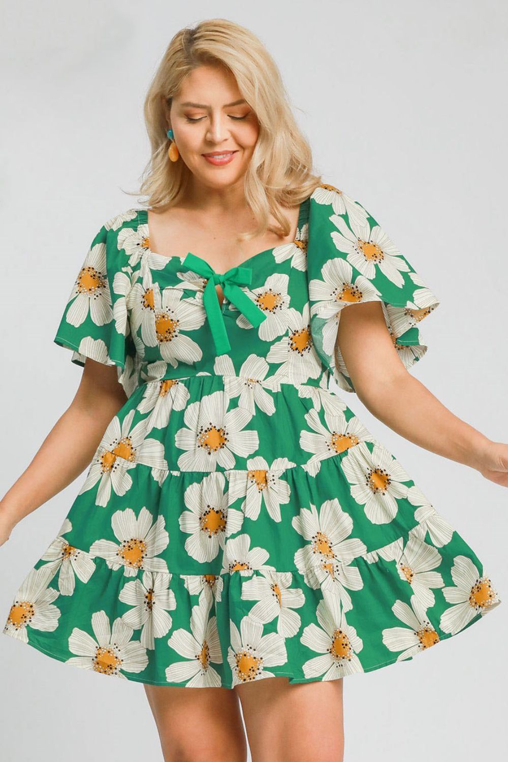 Umgee Plus Size Daisy Print Mini Dress with Ribbon Details.