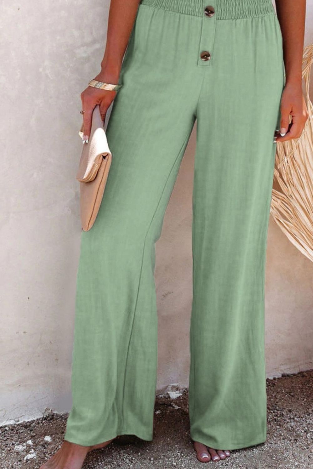 Decorative button high waist pants, opaque.