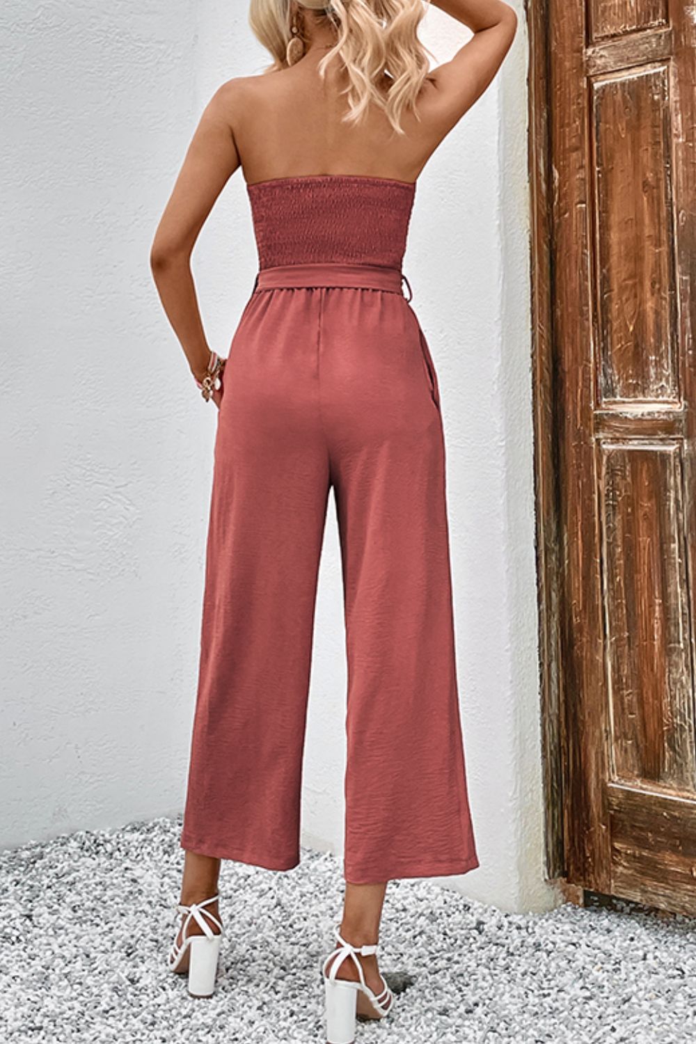 Decorative Button Strapless Smocked Jumpsuit with Pockets and Belted Detail.