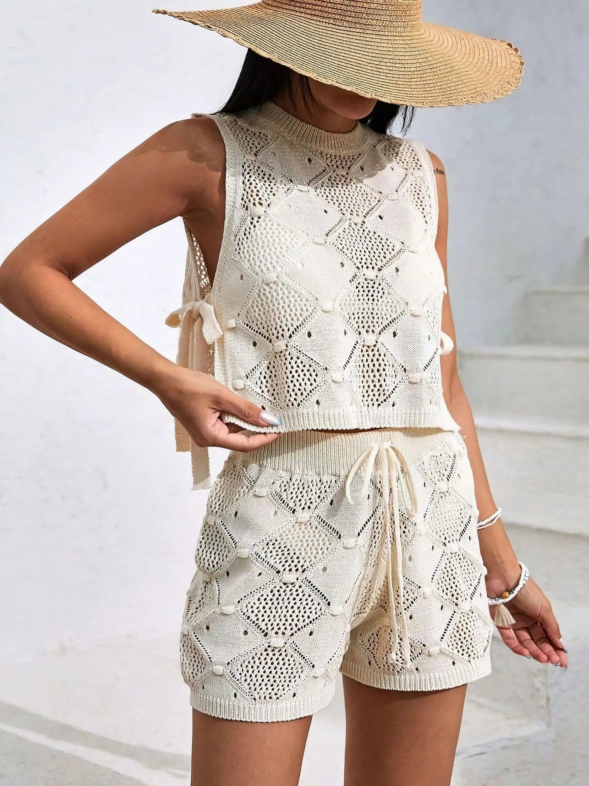 Diamond pattern sleeveless top and shorts knit set, women's stylish two-piece outfit, comfortable knit set, trendy diamond pattern, drawstring details, side slits, openwork design, moderate stretch polyester, ideal for unique casual wear