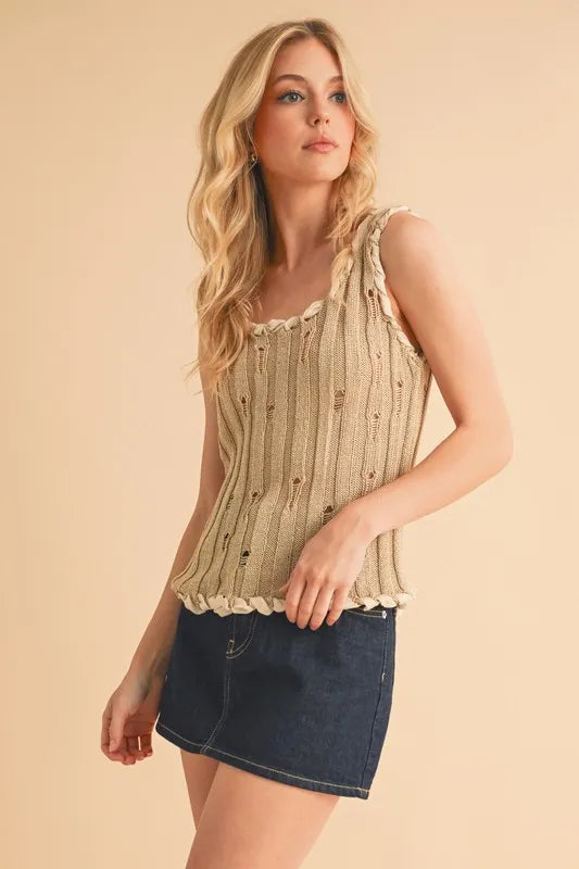 Distressed detail round neck knit tank, slightly stretchy.
