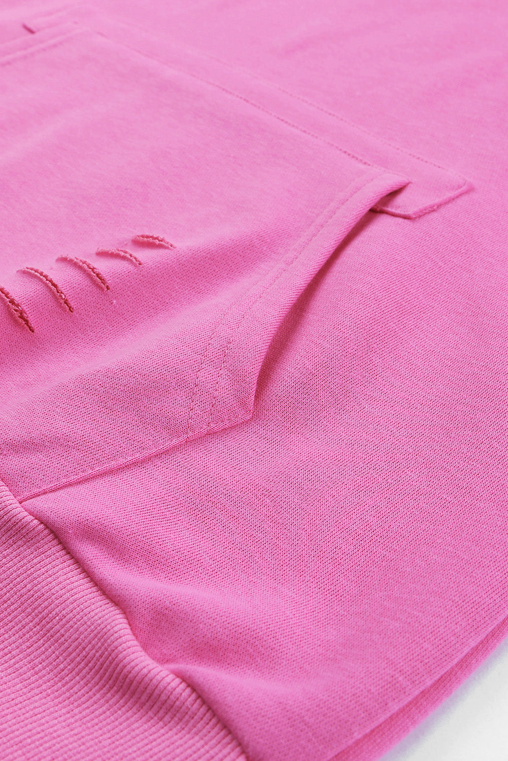 Distressed drawstring long sleeve hoodie with pockets.