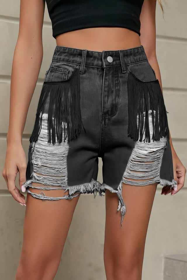 Women's distressed fringe denim shorts with raw hem and pockets.