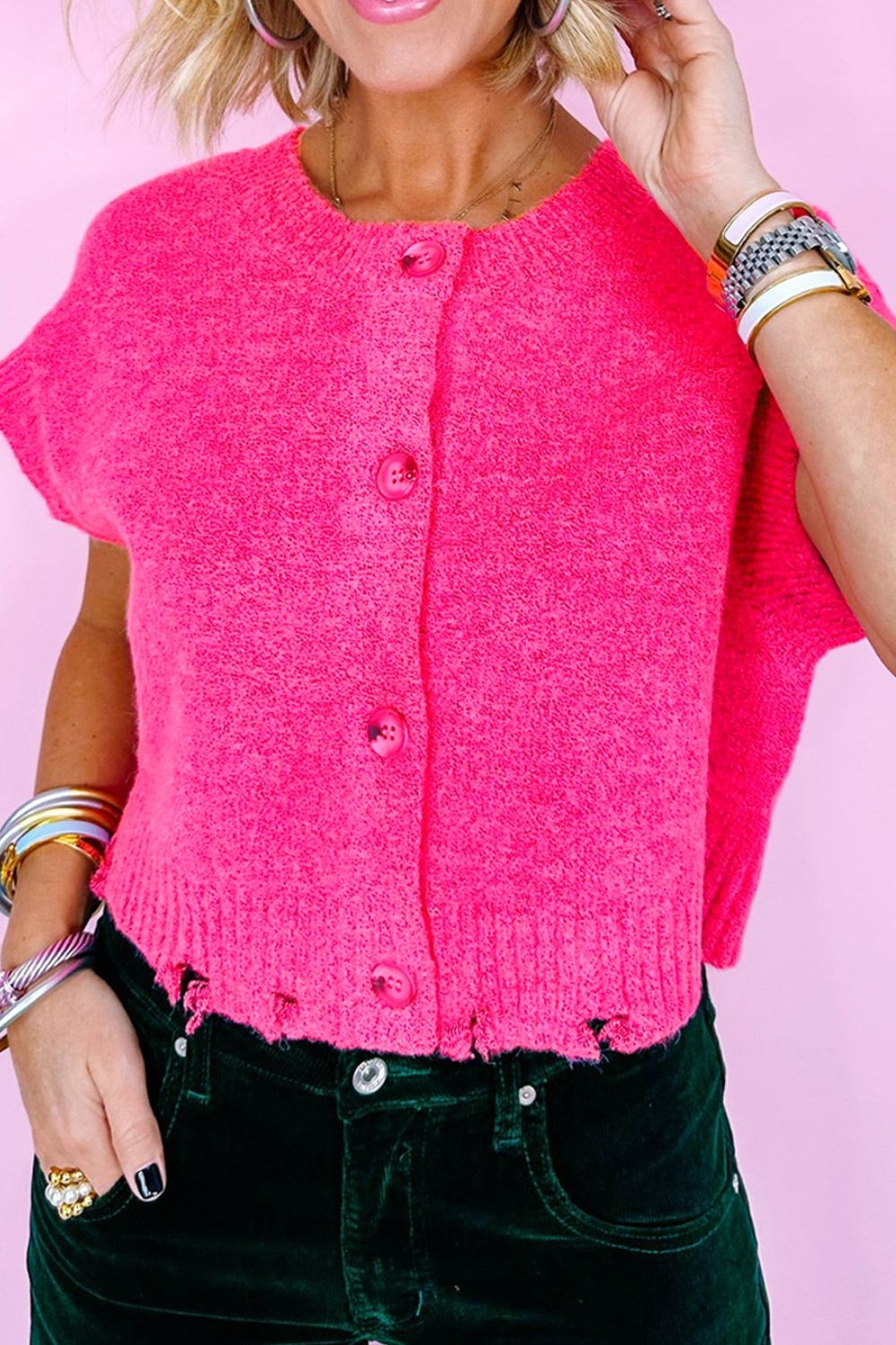 Distressed hem cap sleeve button front sweater.