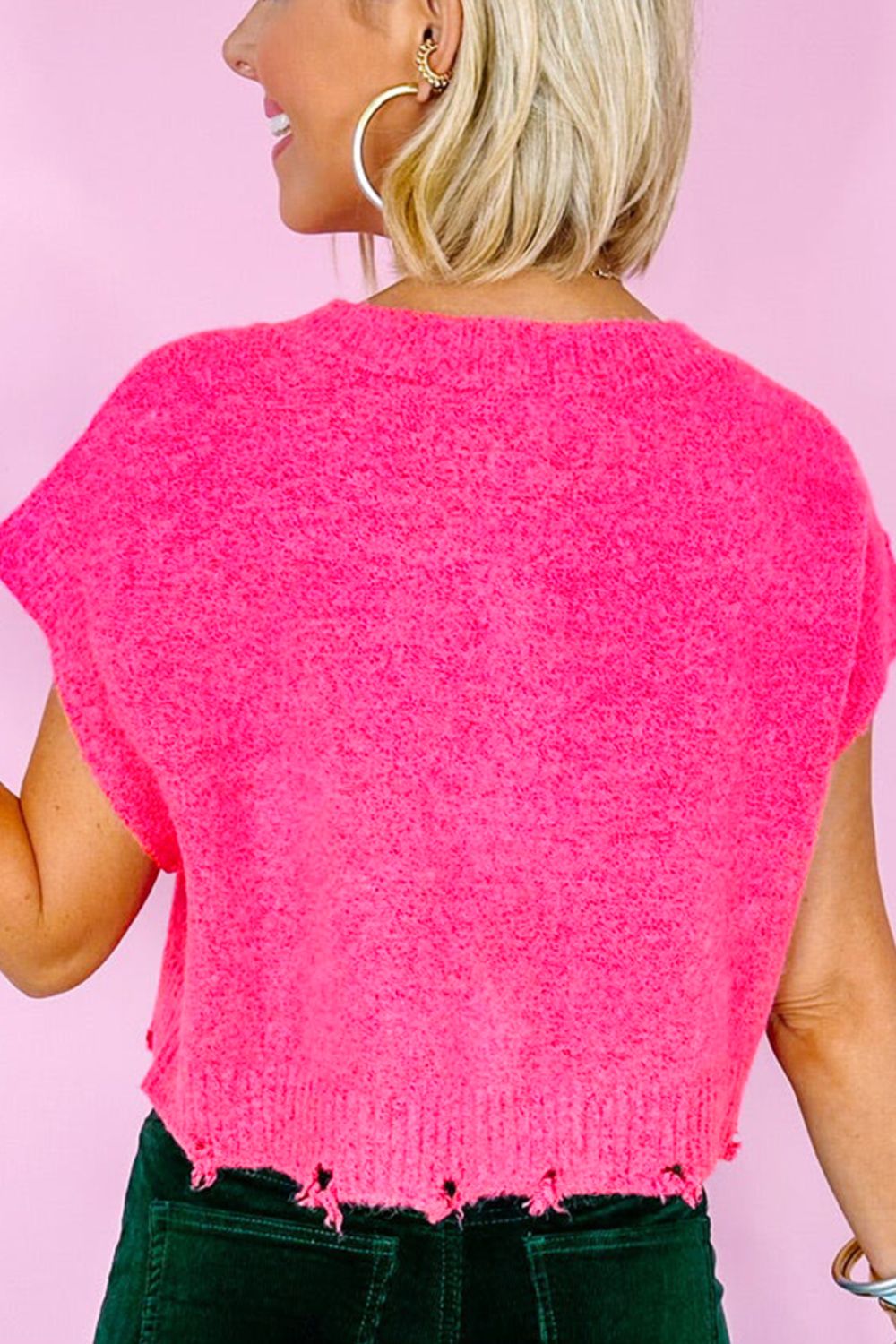 Distressed hem cap sleeve button front sweater.