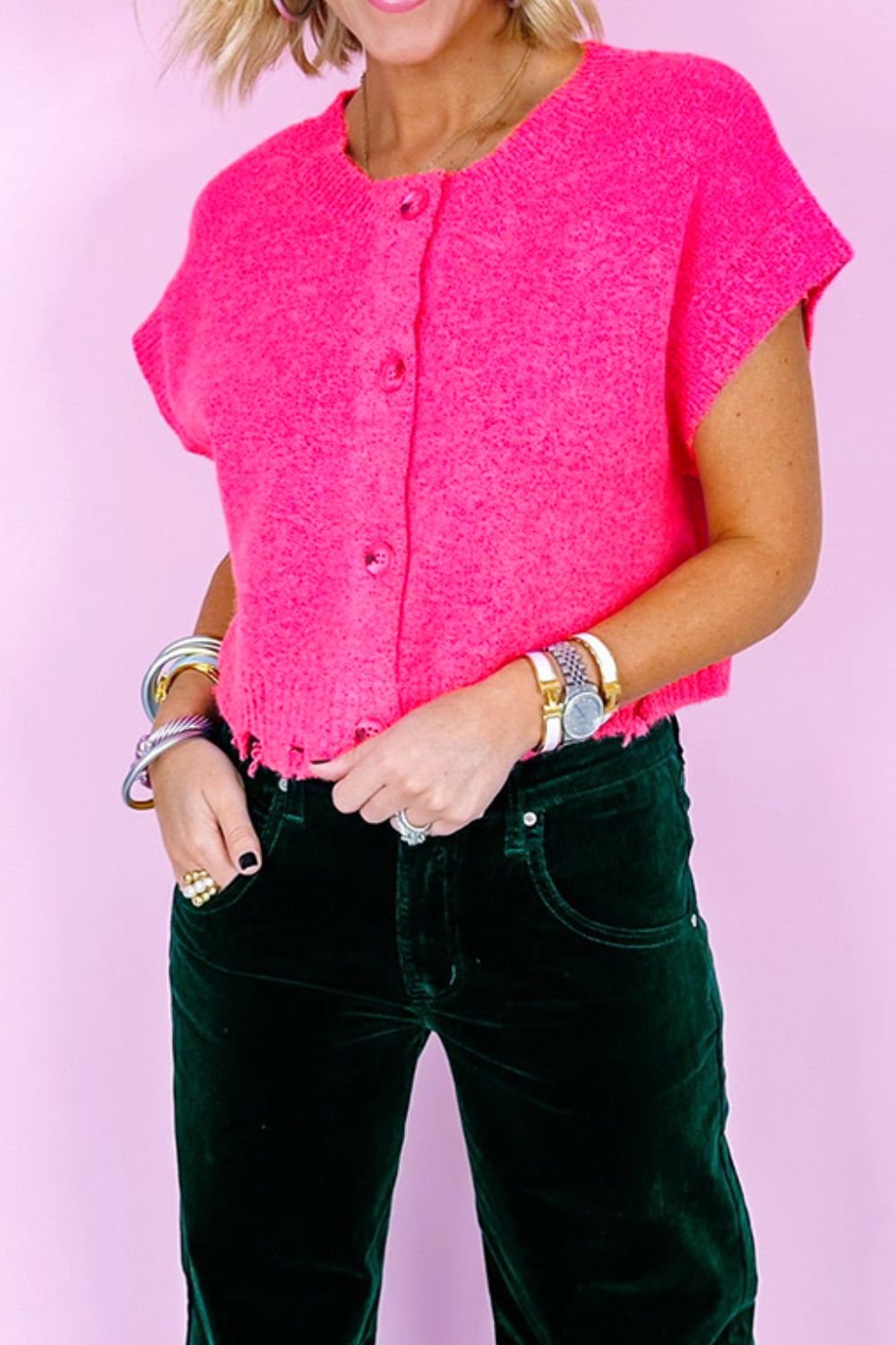 Distressed hem cap sleeve button front sweater.
