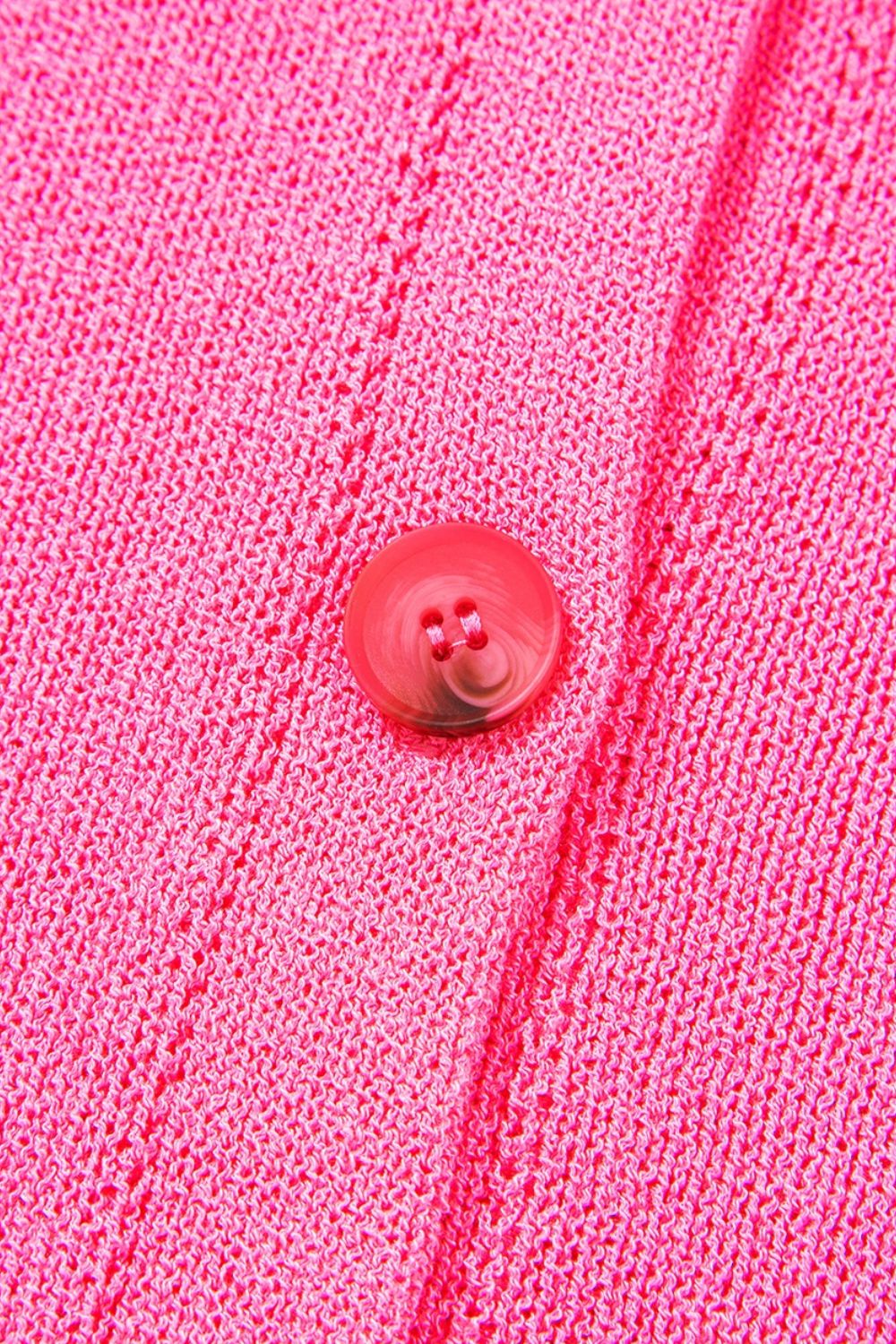 Distressed hem cap sleeve button front sweater.