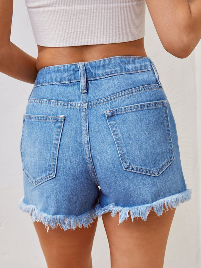 Distressed raw hem denim shorts with pockets and buttons.