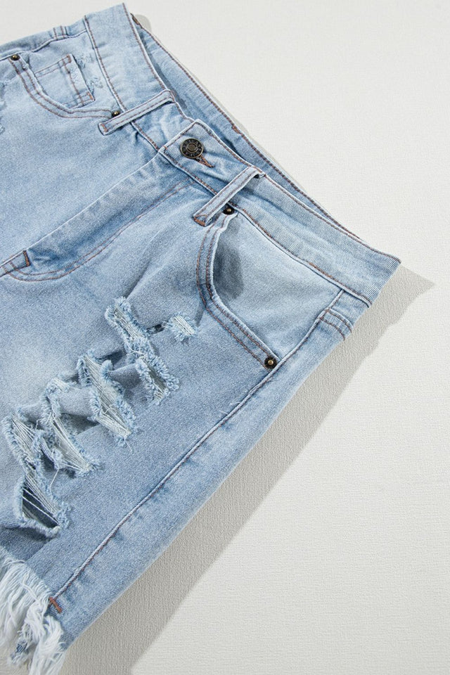 Distressed raw hem high waist denim shorts.