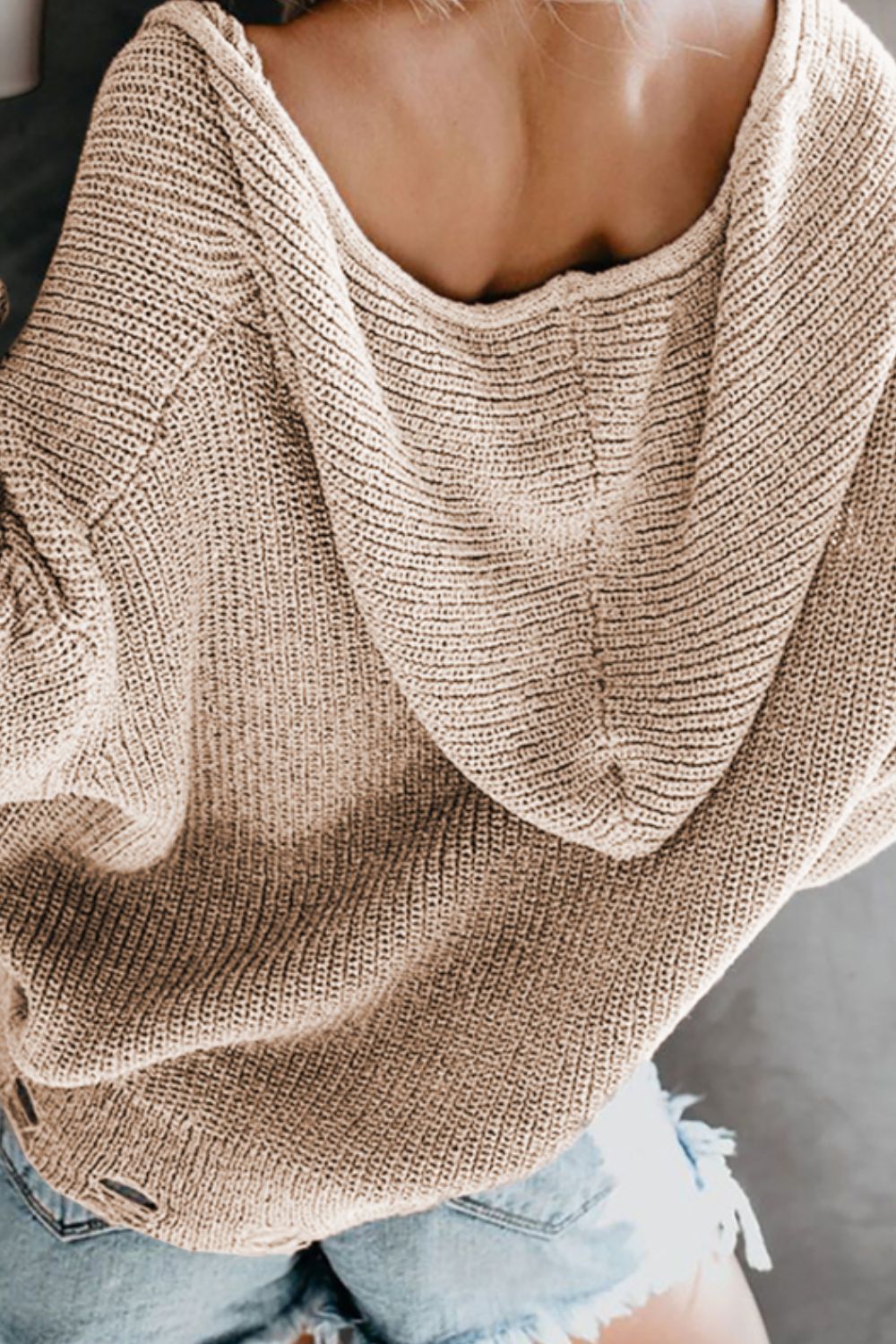 Distressed zip up drawstring hooded cardigan.