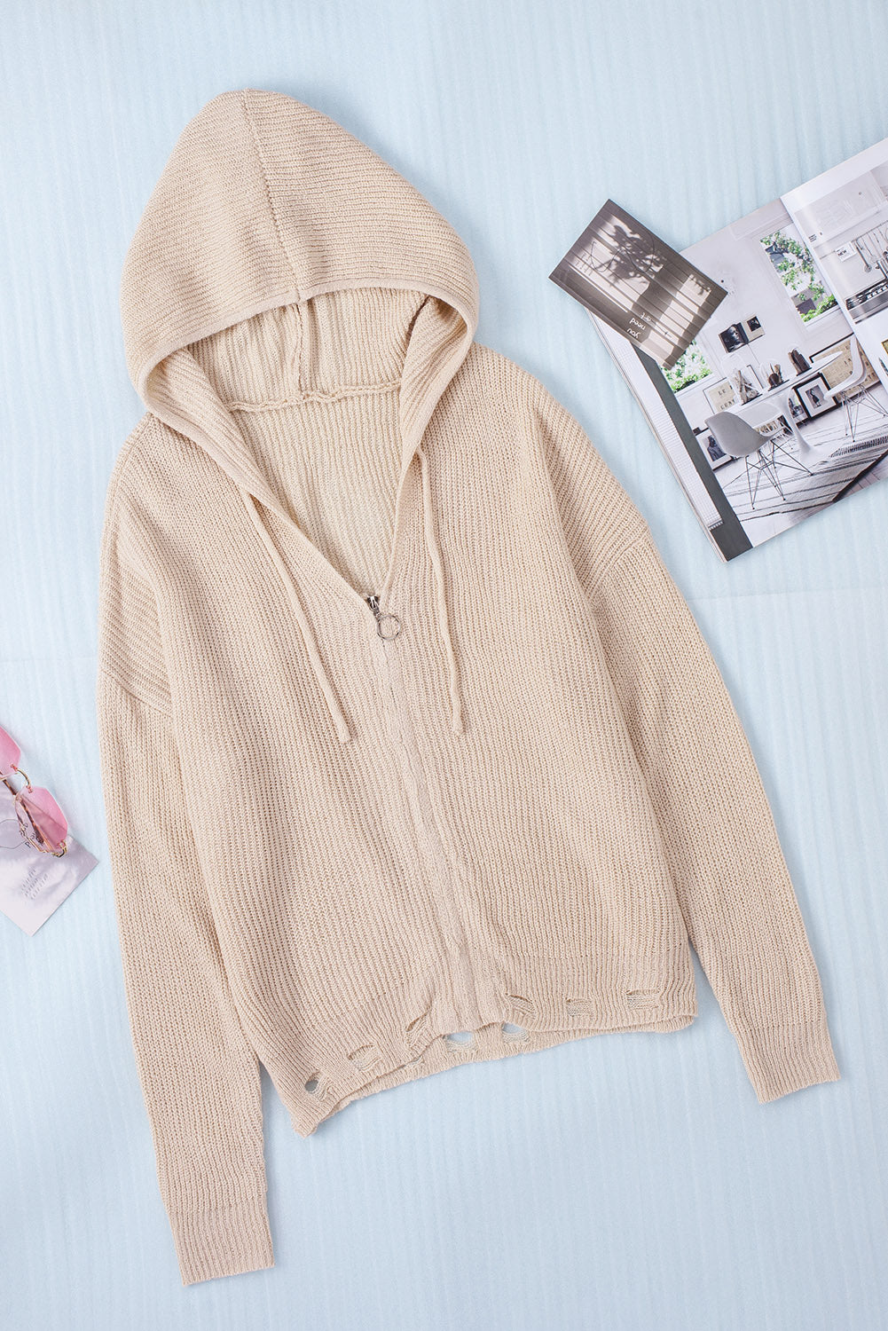 Distressed zip up drawstring hooded cardigan.