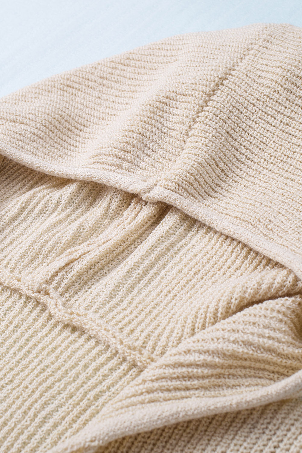 Distressed zip up drawstring hooded cardigan.
