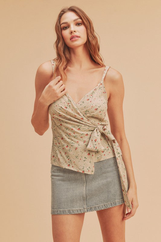 Ditsy floral surplice adjustable straps cami with tie detail.