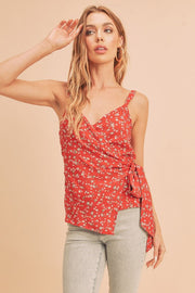 Ditsy floral surplice adjustable straps cami with tie detail.
