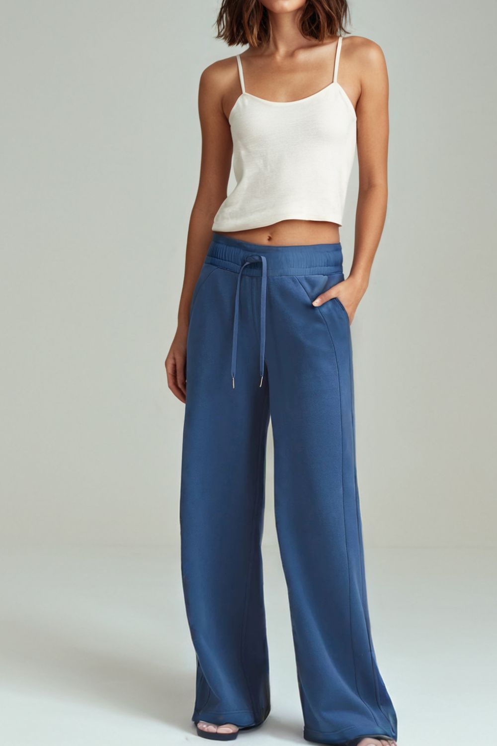 Drawstring elastic waist straight leg pants, opaque.
