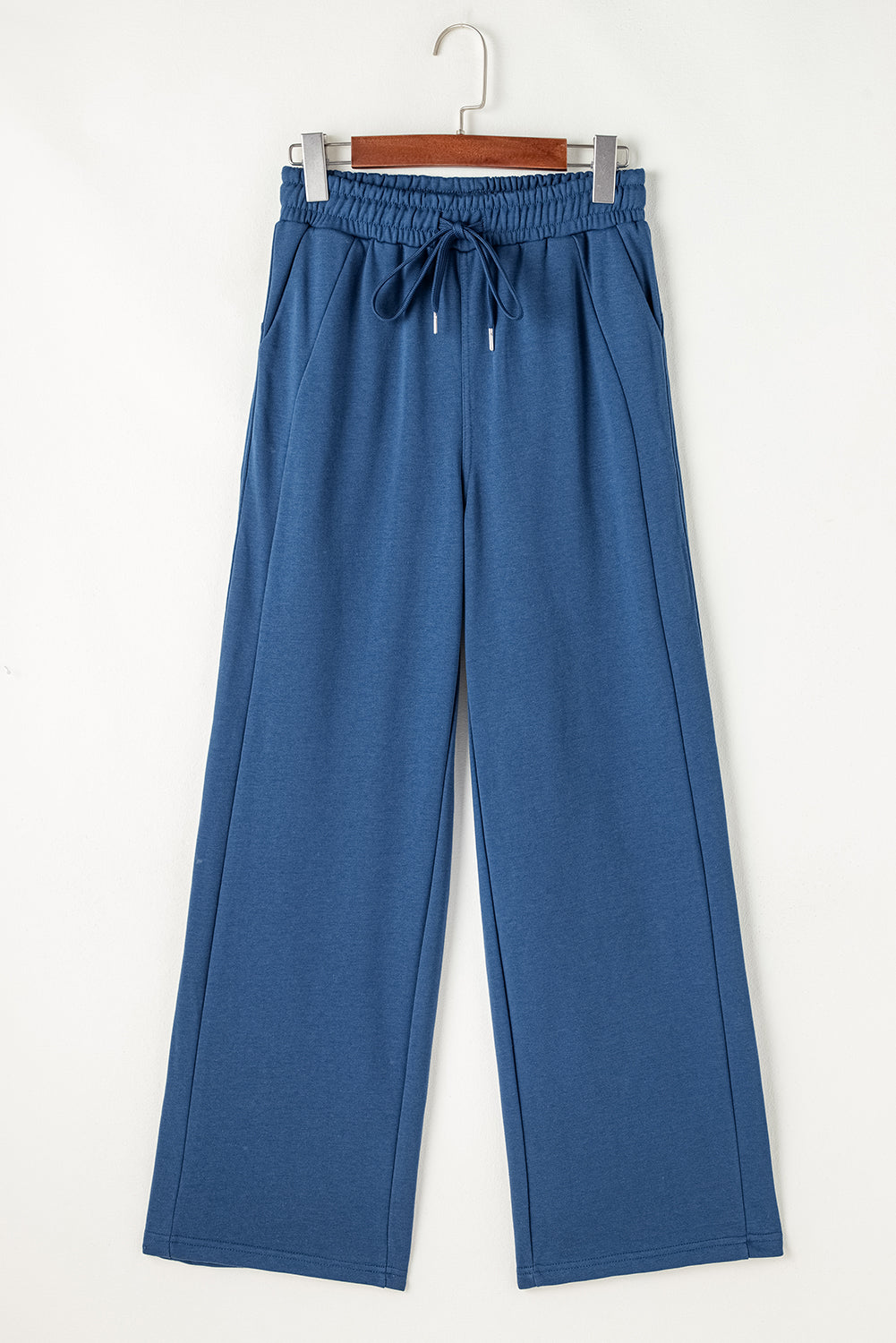 Drawstring elastic waist straight leg pants, opaque.