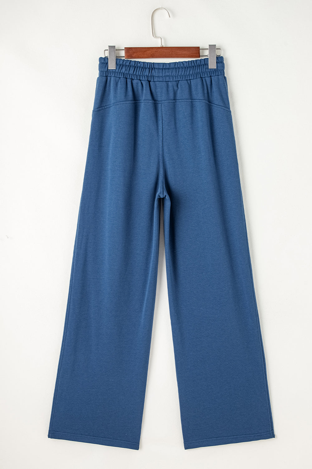 Drawstring elastic waist straight leg pants, opaque.