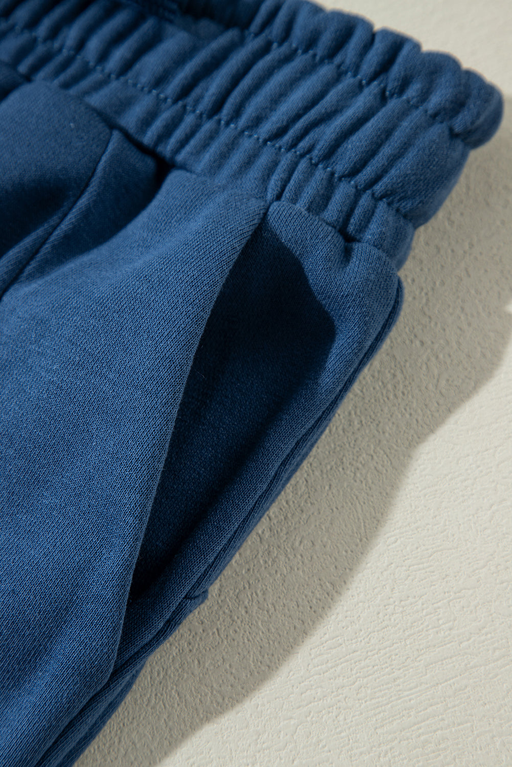 Drawstring elastic waist straight leg pants, opaque.