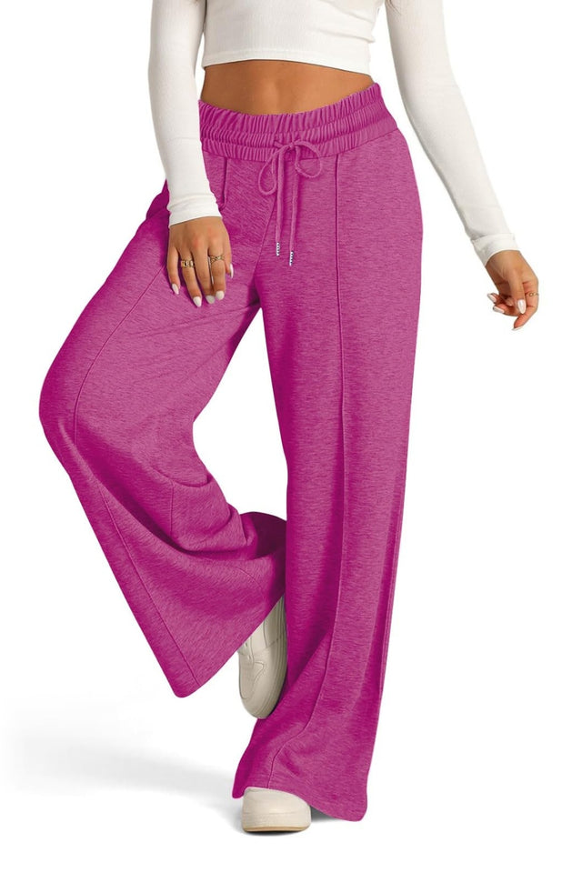 Drawstring elastic waist wide leg pants with pockets, opaque.