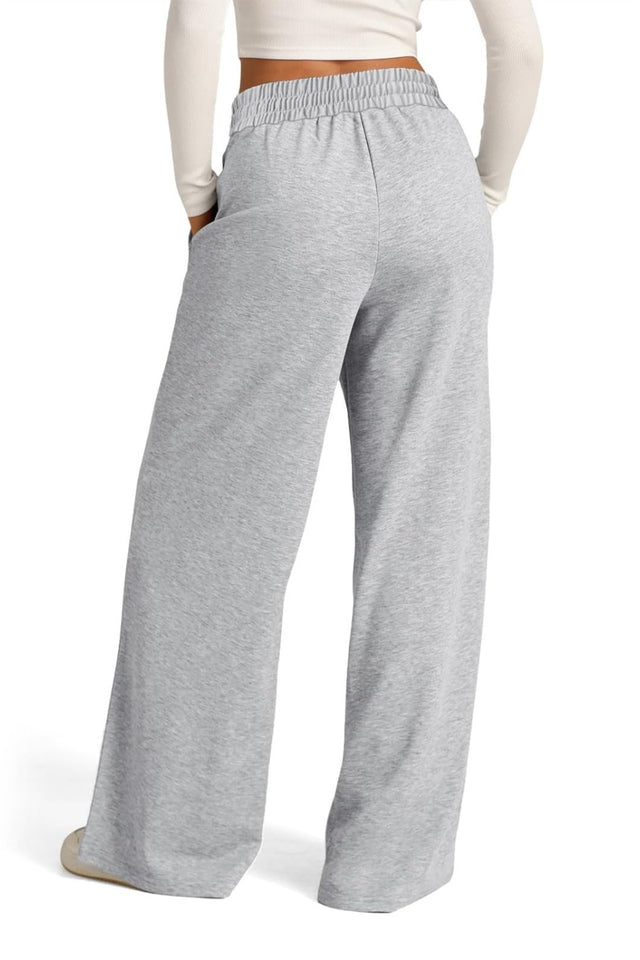 Drawstring elastic waist wide leg pants with pockets, opaque.