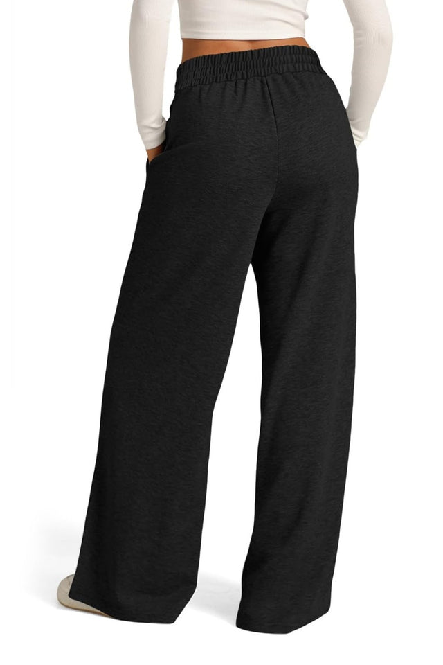 Drawstring elastic waist wide leg pants with pockets, opaque.