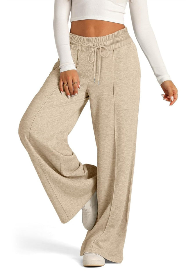 Drawstring elastic waist wide leg pants with pockets, opaque.