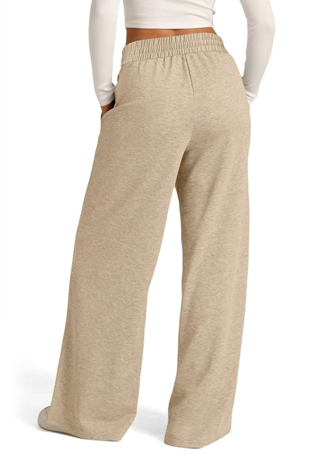 Drawstring elastic waist wide leg pants with pockets, opaque.