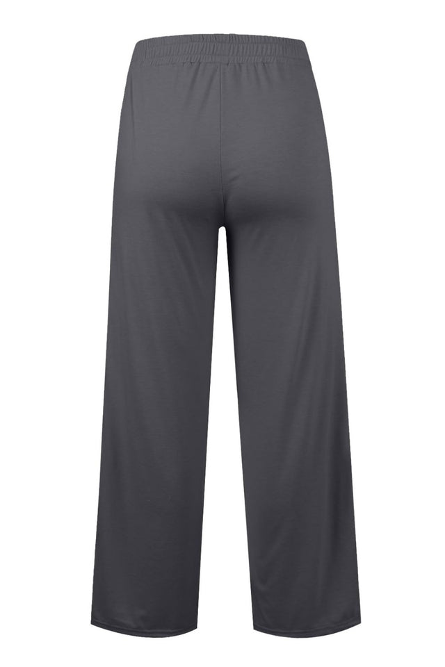 Drawstring elastic waist wide leg pants with pockets, opaque.