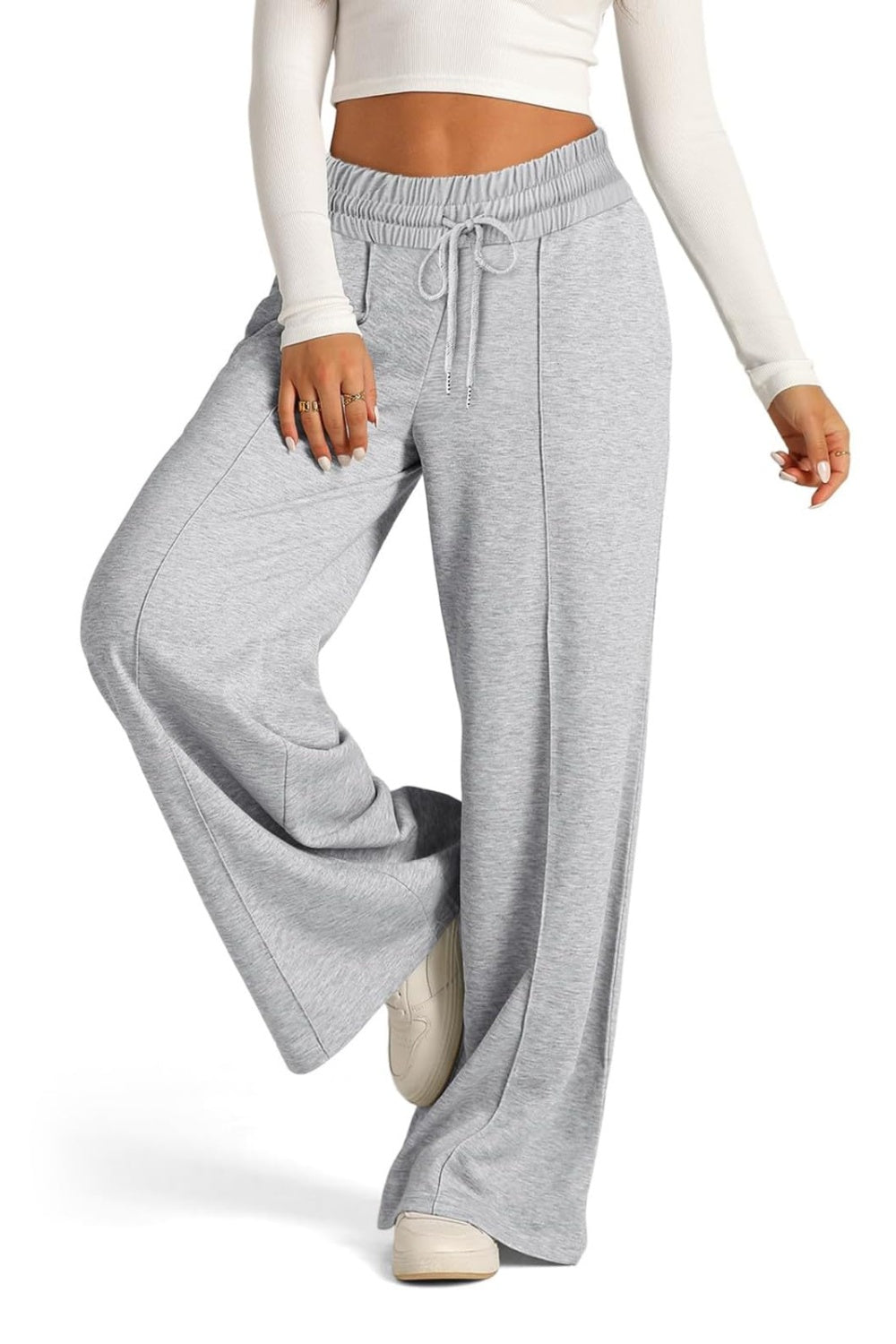Drawstring elastic waist wide leg pants with pockets, opaque.