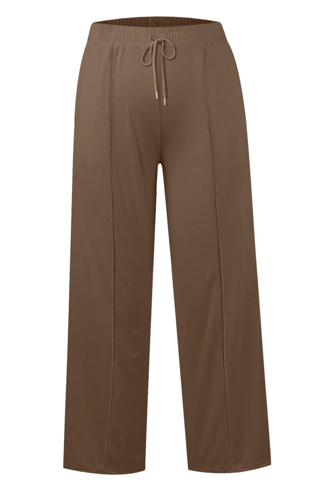 Drawstring elastic waist wide leg pants with pockets, opaque.